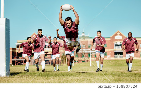 Rugby, athlete on field and sports game with men, team running and player score a try with ball, fitness and active outdoor. Exercise, championship match and teamwork with cheers, action and energy Rugby, athlete on field and sports game with men, team running and player score a try with ball, fitness and active outdoor. Exercise, championship match and teamwork with cheers, action and energy 138907324