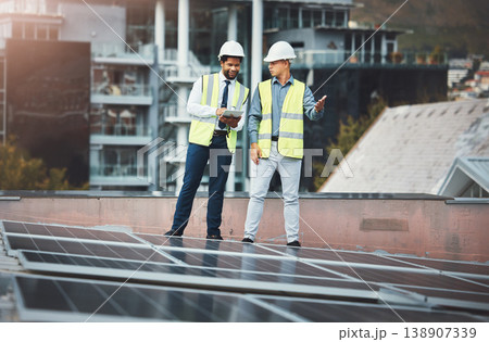 Solar panels, engineering and people with tablet for construction, maintenance and renewable energy. Urban sustainability, teamwork and electricians with digital tech for photovoltaic electricity Solar panels, engineering and people with tablet for construction, maintenance and renewable energy. Urban sustainability, teamwork and electricians with digital tech for photovoltaic electricity 138907339