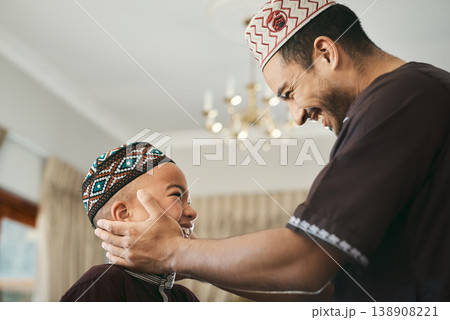 Happy, muslim and father with son in house for bonding, ramadan kareem and love. Support, Islamic celebration and religion with man and child in living room of family home for culture and care 138908221