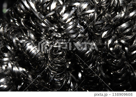 Close up of steel wool metal sponge springs wire 138909608