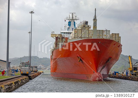 Close cargo ship bow inside Panama Canal lock 138910127