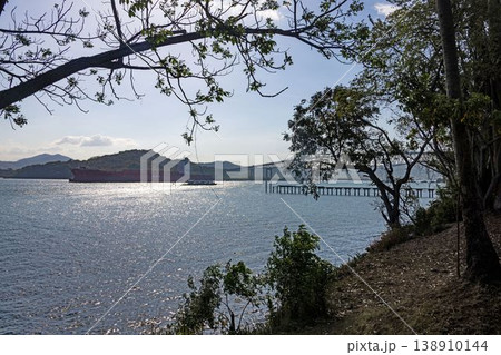 Cargo ship passing Panama Canal with bridge view 138910144