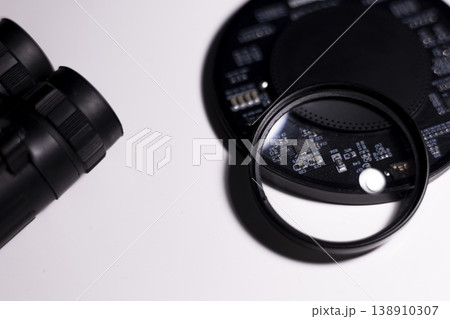 Electronic components in close-up on a white background, magnifying glass Electronic components in close-up on a white background, magnifying glass 138910307
