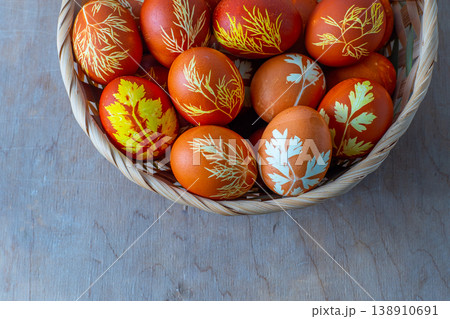 Easter eggs dyed with onion peel, dill and parsley. Natural eco dyes. Egg on the table top view food background. Easter eggs dyed with onion peel, dill and parsley. Natural eco dyes. Egg on the table top view food background. 138910691