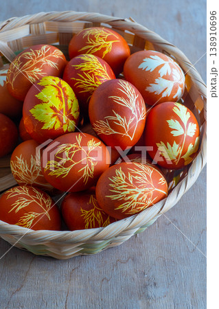 Easter eggs dyed with onion peel, dill and parsley. Natural eco dyes. Egg on the table top view food background. Easter eggs dyed with onion peel, dill and parsley. Natural eco dyes. Egg on the table top view food background. 138910696