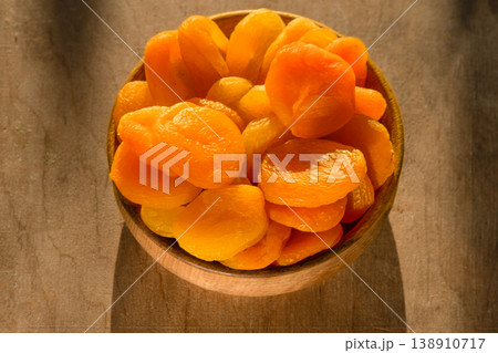 Dried apricots close-up. Apricot fruit food. Top view bowl. Dried apricots close-up. Apricot fruit food. Top view bowl. 138910717