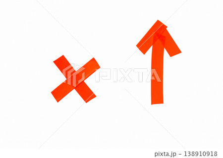 Adhesive red tape creating a cross and an upward arrow, representing choice, decision, direction, and evaluation Adhesive red tape creating a cross and an upward arrow, representing choice, decision, direction, and evaluation 138910918