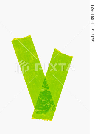 Green tape creating a distinct check mark symbol on a clean white surface, representing confirmation, approval, and success Green tape creating a distinct check mark symbol on a clean white surface, representing confirmation, approval, and success 138910921