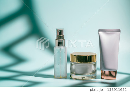 Three skincare products on blue Three skincare products on blue 138911622