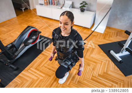 Home fitness with electric muscle stimulation Home fitness with electric muscle stimulation 138912805
