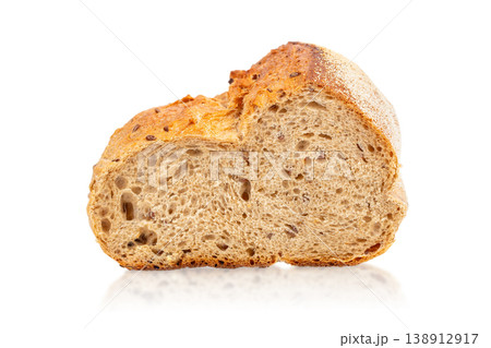Artisan bread cross section isolated on white background, seeded loaf interior closeup Artisan bread cross section isolated on white background, seeded loaf interior closeup 138912917