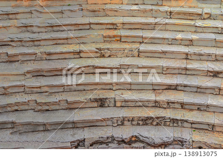 Ancient stone steps of a historic amphitheater in Plovdiv, layered stone blocks with weathered texture and age. Stone heritage, history, archaeology, timeless architecture Ancient stone steps of a historic amphitheater in Plovdiv, layered stone blocks with weathered texture and age. Stone heritage, history, archaeology, timeless architecture 138913075