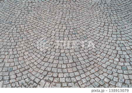 Cobblestone pavement pattern with curved layout, detailed cobblestone texture, masonry structure. Natural background featuring cobblestone texture for design, architecture, backdrop Cobblestone pavement pattern with curved layout, detailed cobblestone texture, masonry structure. Natural background featuring cobblestone texture for design, architecture, backdrop 138913079
