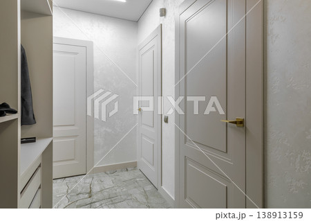 Modern Light Entryway with Classic Doors and Open Wardrobe Modern Light Entryway with Classic Doors and Open Wardrobe 138913159