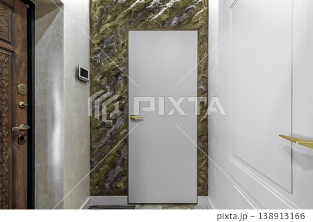 Modern Invisible Door on Decorative Golden Rock Wall Texture Modern Invisible Door on Decorative Golden Rock Wall Texture 138913166