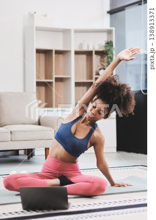 Women exercising in fitness studio yoga classes 138913371