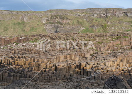 Giants Causeway Golden Hour over Basalt Columns and Mountain Giants Causeway Golden Hour over Basalt Columns and Mountain 138913583