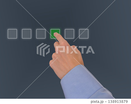 Hand touch green square for business choice control on digital interface selection screen Hand touch green square for business choice control on digital interface selection screen 138913879