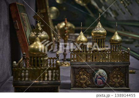 Ornate Orthodox church chalice with icon of Jesus Christ, religious liturgical object close up Ornate Orthodox church chalice with icon of Jesus Christ, religious liturgical object close up 138914455