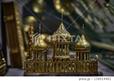 Ornate Orthodox church chalice with icon of Jesus Christ, religious liturgical object close up Ornate Orthodox church chalice with icon of Jesus Christ, religious liturgical object close up 138914461