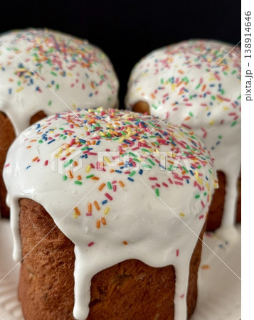 Easter cakes with white icing and sprinkles. A traditional homemade Easter pastry. Easter cakes with white icing and sprinkles. A traditional homemade Easter pastry. 138914646