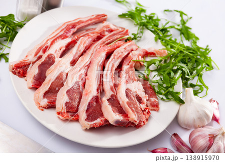 Chops of fresh raw lamb ribs Chops of fresh raw lamb ribs 138915970