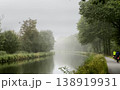 Experience the Misty Canal Serenity Surrounded by Vibrant Lush Greenery for a Truly Idyllic Escape 138919931