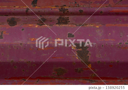 Red rusted painted metal surface texture with peeling industrial wear Red rusted painted metal surface texture with peeling industrial wear 138920255