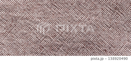 Pink mauve woven fabric texture background with geometric diamond pattern close-up 138920490