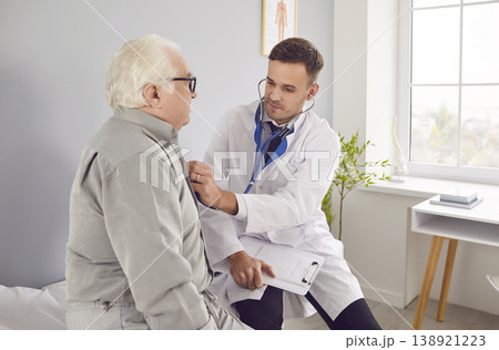 Senior nursing, health care of elderly people, young doctor, male geriatric nurse helping checking  138921223