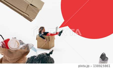 Woman sitting inside cardboard box with laptop and big copy space speech bubble 138923861