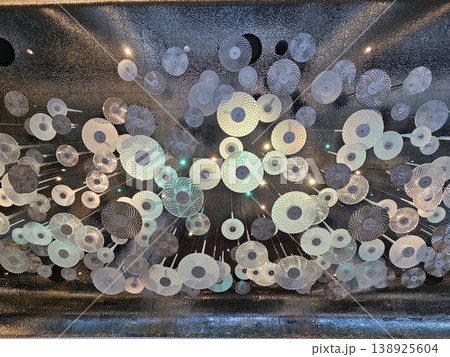 Large, intricate design of many small, round objects 138925604