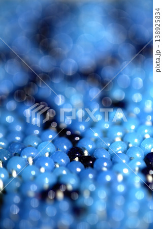 Cute craft small glass beads in an abstract pattern for background 138925834