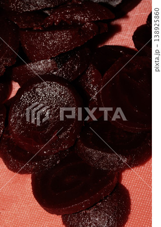 Close up of chopped red beetroot on a red background 138925860