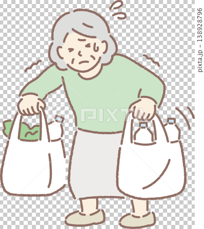 重い買い物袋を持つ高齢女性 重い買い物袋を持つ高齢女性 138928796
