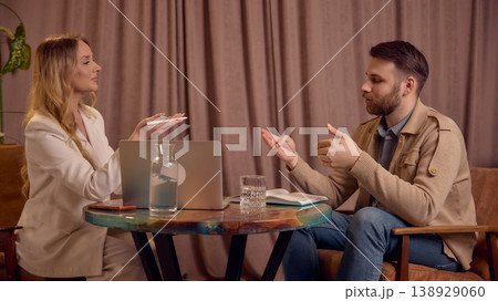Two people discussing feelings and ideas during mental coaching session. 138929060