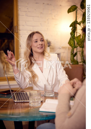 Female mental coach explaining thoughts and emotions during therapy session Female mental coach explaining thoughts and emotions during therapy session 138929061