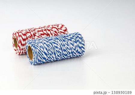 Colorful Red White and Blue Twisted Baker's Twine Rolls for Packaging and Craft Projects 138930189