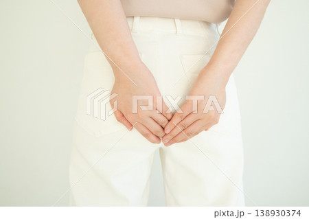 Woman suffering from anal pain and discomfort. Cause of pain include hemorrhoid, anal fissure, diarrhea, constipation or Crohn's disease. Gastrointestinal system concept. 138930374