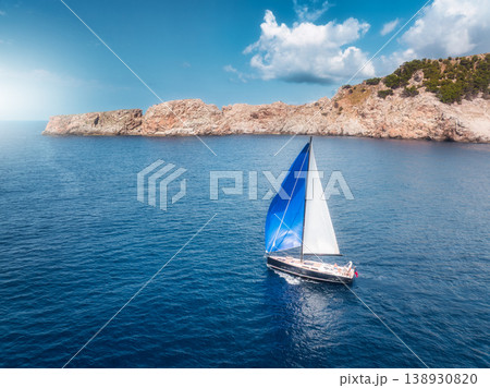 Aerial view of beautiful sailboat. Boat on the sea in summer Aerial view of beautiful sailboat. Boat on the sea in summer 138930820