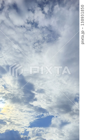 City sky with clouds, spring thunderstorms. Beautiful pink and orange clouds. 138931850