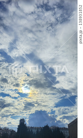 City sky with clouds, spring thunderstorms. Beautiful pink and orange clouds. 138931852