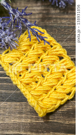 Knitting patterns with a raised pattern and yarn of different colors 138931856