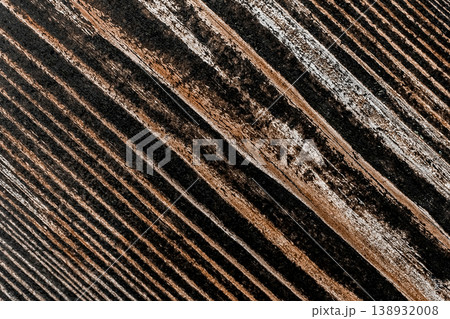 Closeup lines texture stripes old wooden dark brown surface wood background board pattern plank Closeup lines texture stripes old wooden dark brown surface wood background board pattern plank 138932008