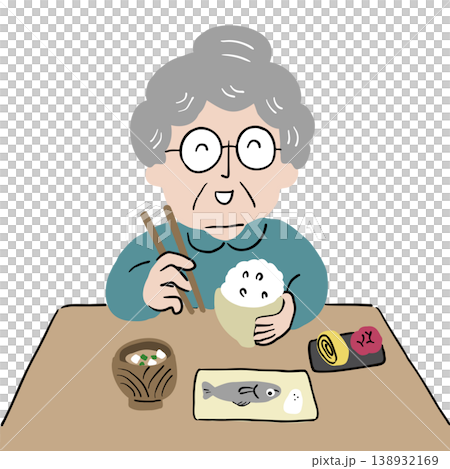 おばあさんがお箸を持って日本食のご飯を食べている2 138932169