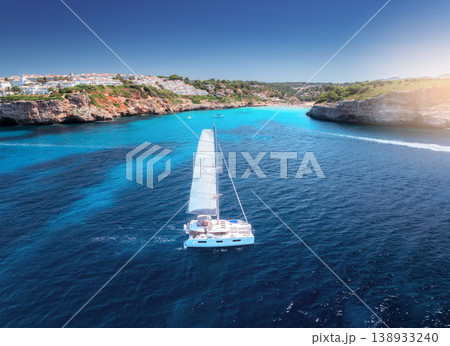 Aerial view of beautiful sailboat. Boat on the sea in summer Aerial view of beautiful sailboat. Boat on the sea in summer 138933240