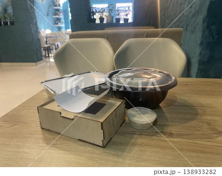 a bowl of food with chekbox on a table a bowl of food with chekbox on a table 138933282