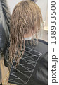 Women's haircut and coloring at the beauty salon. Hair wash. Long blonde hair. 138933500