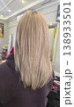 Women's haircut and coloring at the beauty salon. Hair wash. Long blonde hair. 138933501