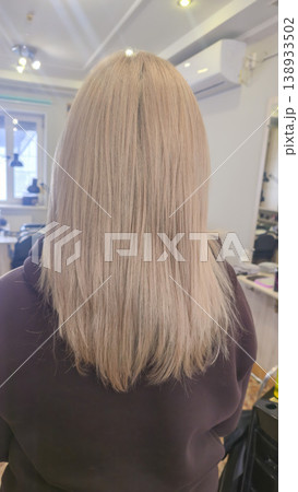 Women's haircut and coloring at the beauty salon. Hair wash. Long blonde hair. Women's haircut and coloring at the beauty salon. Hair wash. Long blonde hair. 138933502